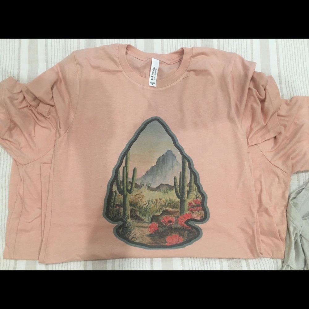 Peach Arrowhead Tee on Bella Canvas